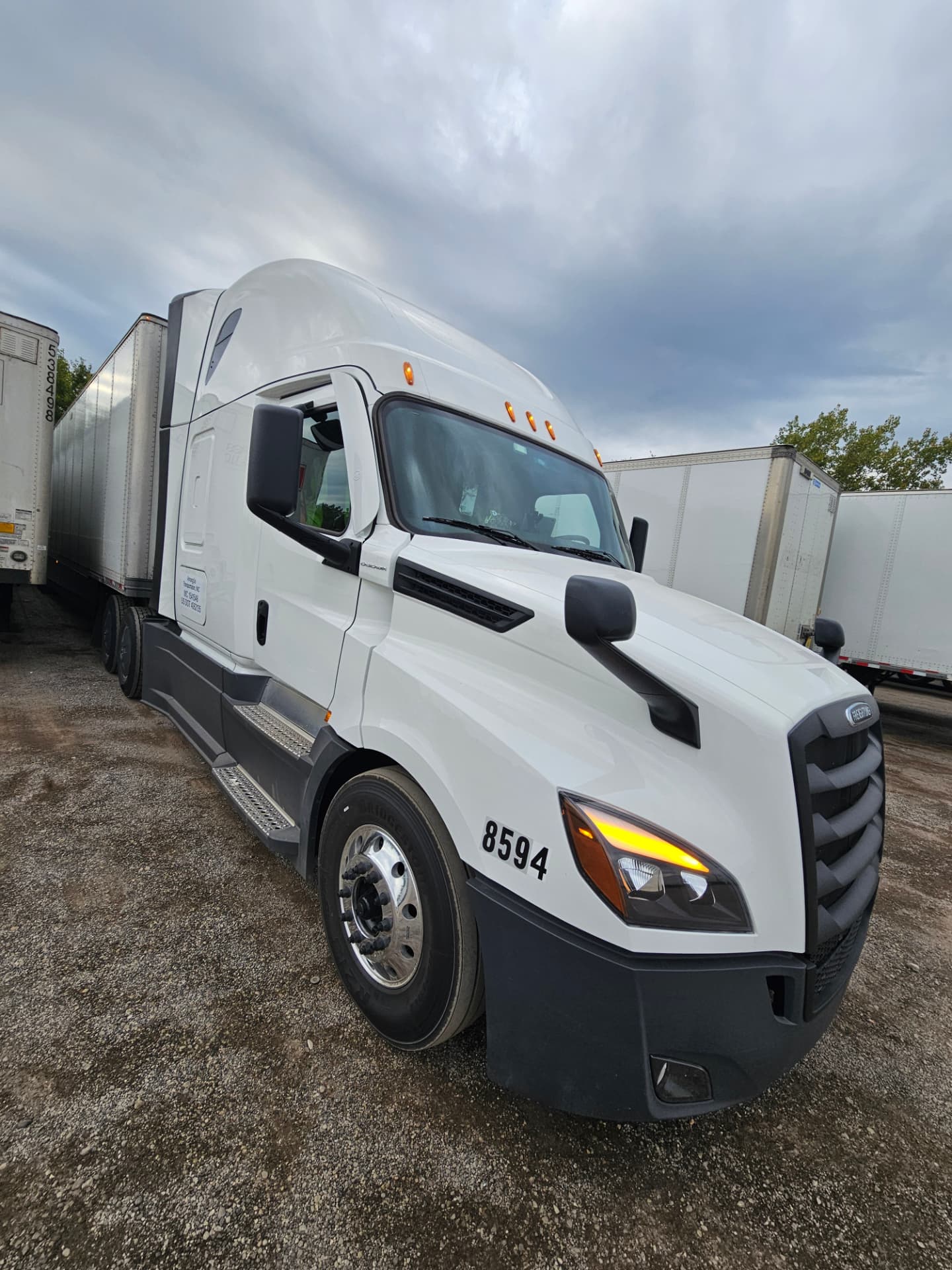Seven Space Trucking sleeper tractor hooked to a dry van trailer